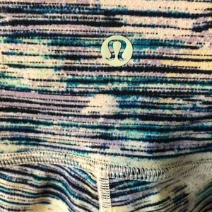 Lululemon leggings, size 6. Fun colors with stripes and floral prints.